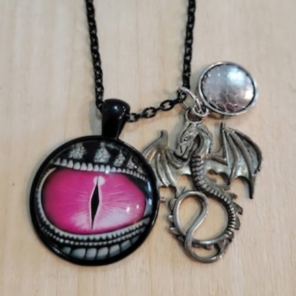 Beautiful "Eye of the Dragon" Necklace with crystals and a charms